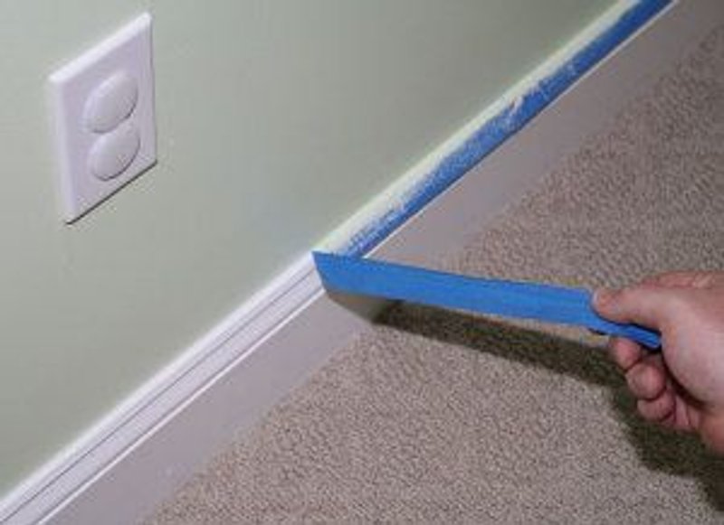 poner cinta para pintar